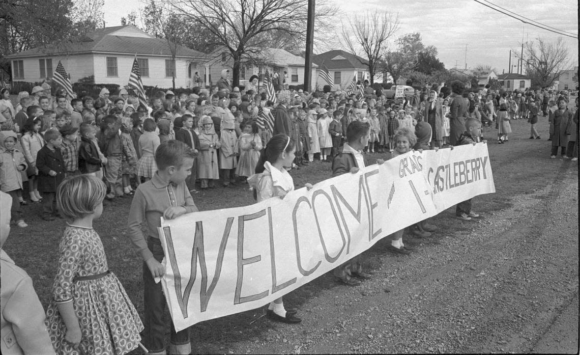 President John F. Kennedy’s motorcade leaving Fort Worth along streets lined with school children from Castleberry Elementary School, Fort Worth, 11/22/1963