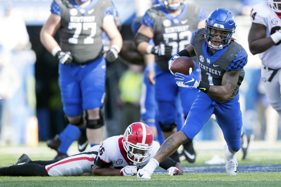 Kentucky wide receiver Lynn Bowden Jr. (1) runs with the ball during the first half an NCAA college football game against Georgia in Lexington, Ky., Saturday, Nov. 3, 2018. (AP Photo/Bryan Woolston)