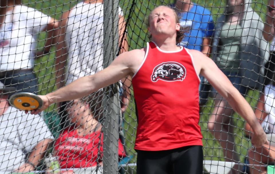 Manchester's Josiah Cox lets loose with a discus at the Div. II state track field championships at Jesse Owen Stadium in Columbus on Saturday. Cox took the championship with a throw of 176-11.