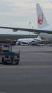 A Singapore airline aircraft is seen on tarmac after requesting an emergency landing at Bangkok's Suvarnabhumi International airport, Thailand