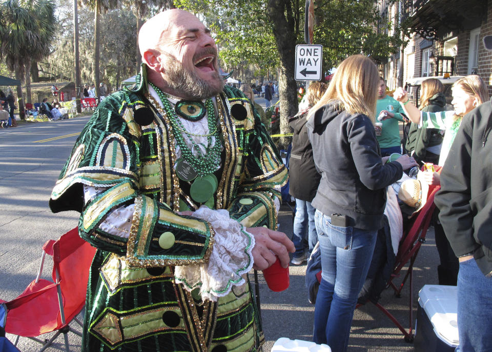 FILE - Brian Welzenbach laughs with friends, March 17, 2017, while celebrating St. Patrick's Day in Savannah, Ga. Savannah, Georgia's oldest city, is planning a supersized celebration as it marks the 200th anniversary of its beloved St. Patrick's Day parade. City Manager Jay Melder says he's expecting historic crowds for the Irish-themed parade Saturday, March 16, 2024. (AP Photo/Russ Bynum, file)