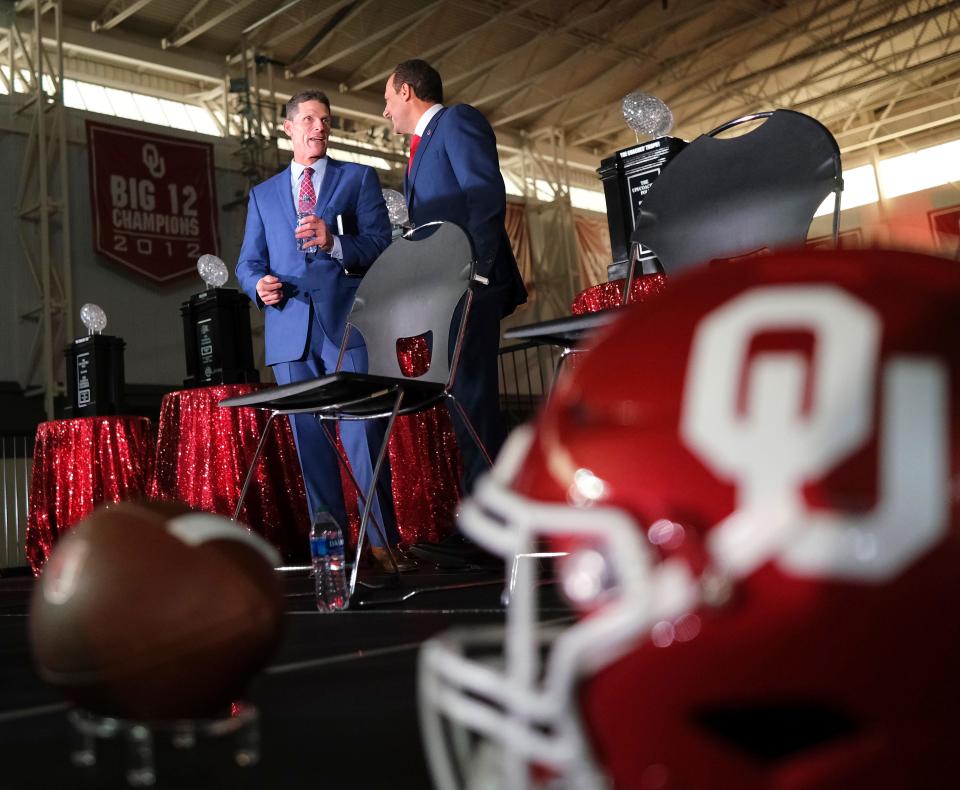 Brent Venables speaks with OU president Joseph Harroz on Monday at the Everest Training Center in Norman.