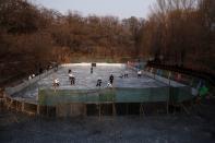 The Wider Image: On a frozen pond far from the Olympics, meet China's ice hockey veterans