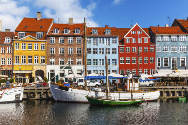 Scenic summer view of color buildings of Nyhavn in Copehnagen, Denmark. Visit also lightbox of high quality photos of Scandinavi