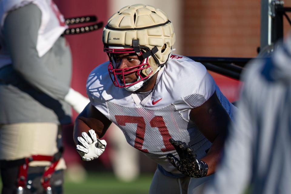 Florida State Seminoles offensive lineman D'Mitri Emmanuel (71) practices with the team on Wednesday, Oct. 18, 2023.