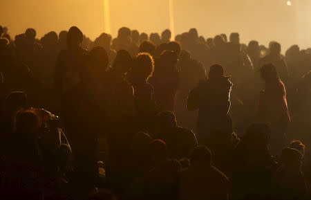 Migrants wait to cross the Slovenia-Austria border in Sentilj, Slovenia, October 27, 2015. REUTERS/Srdjan Zivulovic