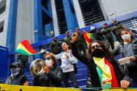 Demonstrators participate in a protest in La Paz