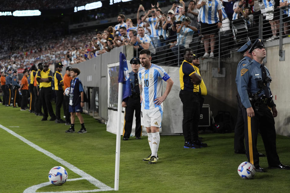 Argentina's Lionel Messi prepares to shot a corner kick during a Copa America Group A soccer match against Chile in East Rutherford, N.J., Tuesday, June 25, 2024. (AP Photo/Julia Nikhinson)