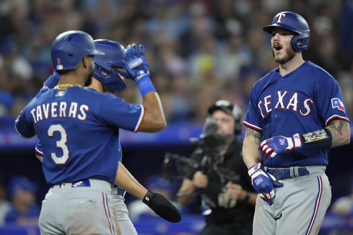 Heim launches grand slam, Carter hits 1st career home run as the Rangers  beat the Blue Jays 10-4