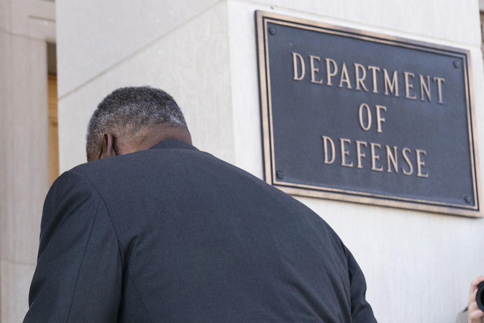 Defense Secretary Lloyd Austin arrives at the Pentagon, Friday, Jan. 22, 2021, in Washington. (AP Photo/Alex Brandon)