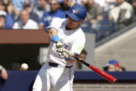 Toronto Blue Jays' Daulton Varsho (25) hits a two-run double during the fifth inning of a baseball game against the Tampa Bay Rays, Saturday, May 18, 2024, in Toronto. (Chris Young/The Canadian Press via AP)