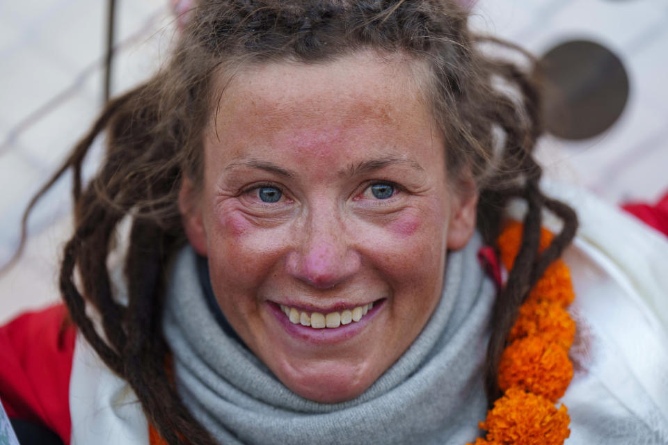 Norwegian climber Kristin Harila, 37, smiles after arriving in Kathmandu, Nepal, Thursday, May 4, 2023. Harila who just became the fastest female climber to scale the 14 highest mountains in the world is now aiming to become the fastest person to complete the feat, beating a record set by a male climber in 2019. (AP Photo/Niranjan Shrestha)