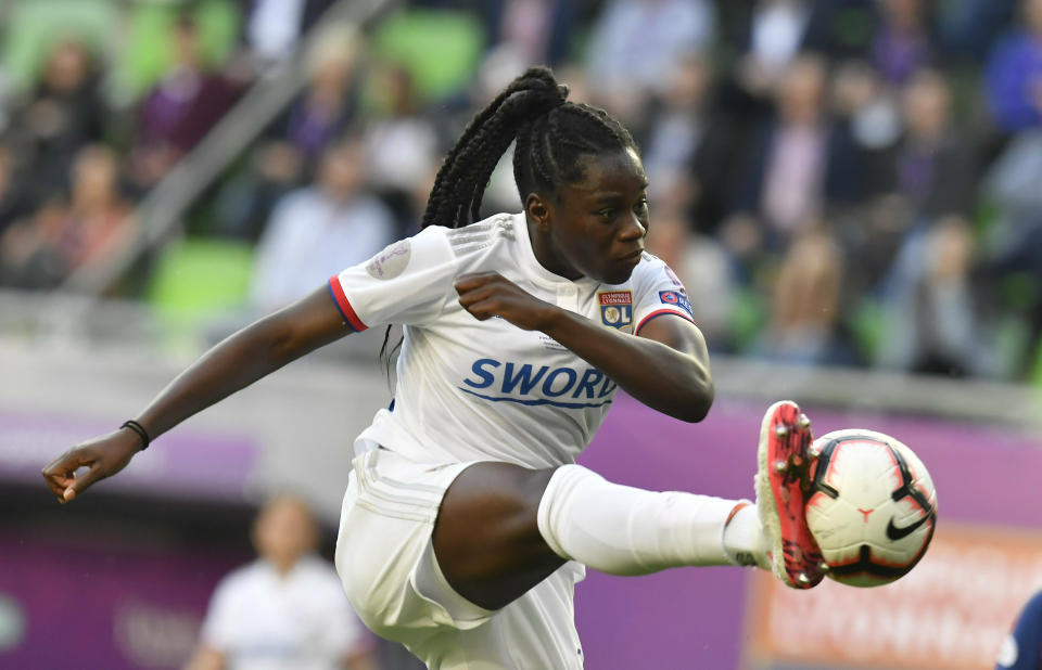 Griedge M'Bock Bathy of Lyon in action during the women's soccer UEFA Champions League final match between Olympique Lyon and FC Barcelona at the Groupama Arena in Budapest, Hungary, Saturday, May 18, 2019. (Tibor Illyes/MTI via AP)