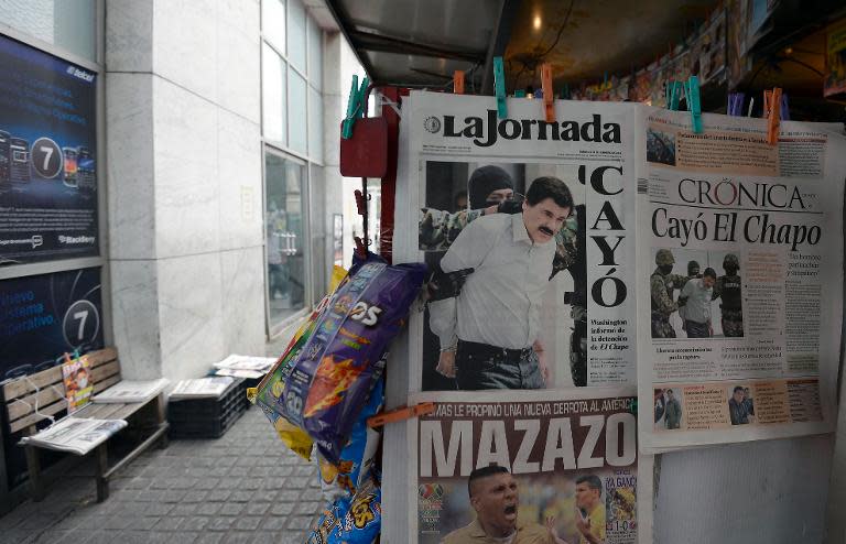 Mexican newspapers in Mexico City, on February 23, 2014 report the arrest of Mexican drug trafficker Joaquin Guzman Loera aka "el Chapo Guzman."