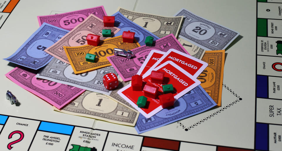 General view of money on a Monopoly Board.   (Photo by Lynne Cameron/PA Images via Getty Images)