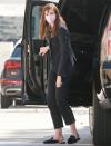 <p>Anne Hathaway wears head-to-toe black for a business meeting in Los Angeles on Wednesday.</p>