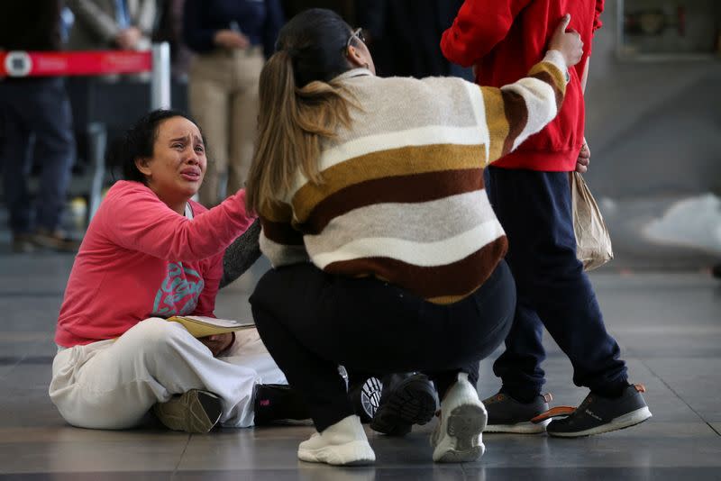 Colombian migrants deported from the U.S. arrive at the El Dorado International Airport in Bogota