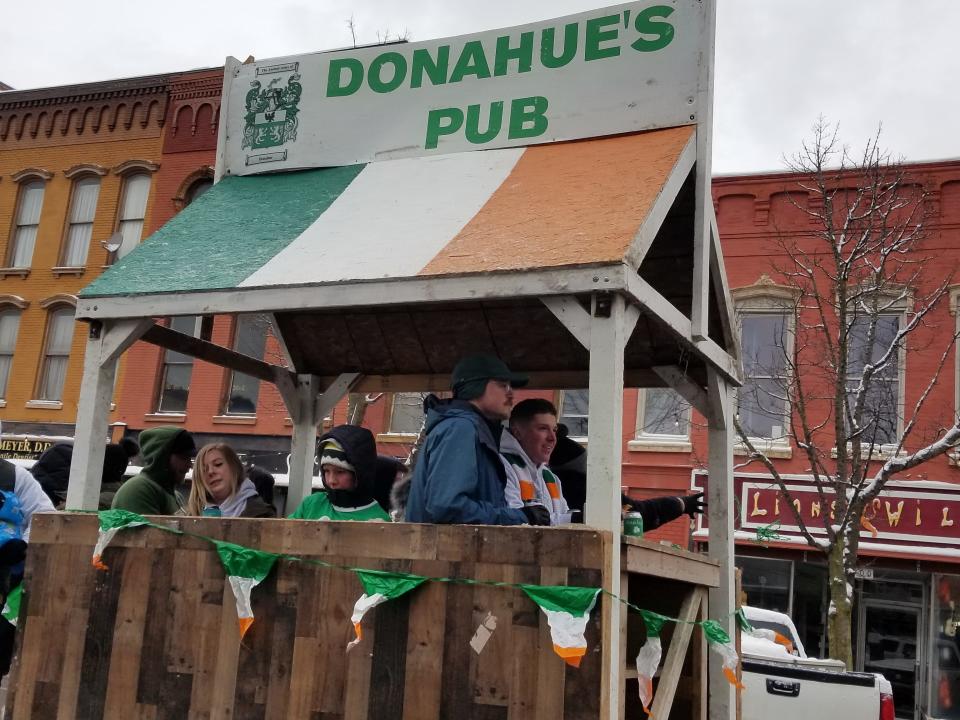 Floats of all shapes and sizes travel down Main Street during the Hornell St. Patrick's Day parade.