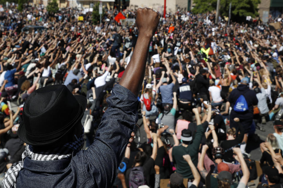 Protesters gather Saturday, May 30, 2020, in Minneapolis. Protests continued following the death of George Floyd, a black man who was killed in police custody in Minneapolis on May 25. (AP Photo/John Minchillo)