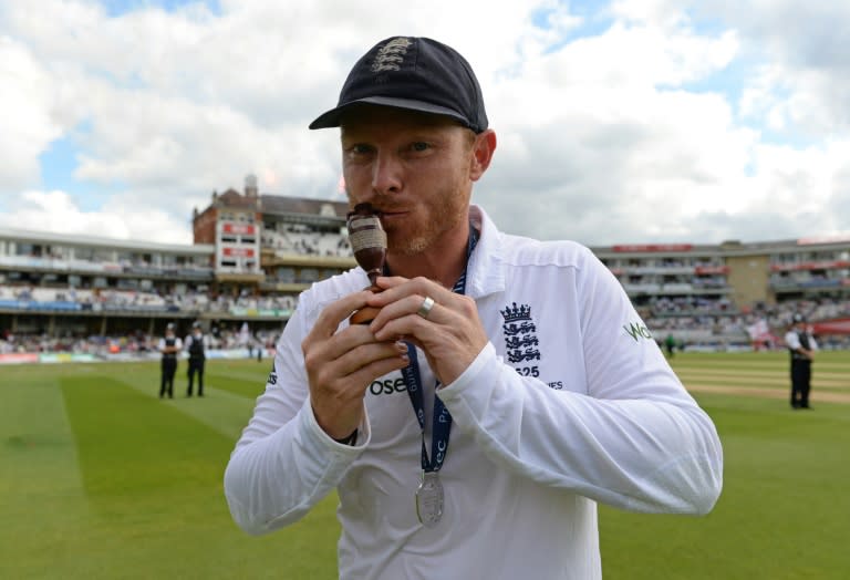 Ian Bell kisses the replica Ashes urn as England celebrate a series victory against Australia at the Oval in London on August 23, 2015