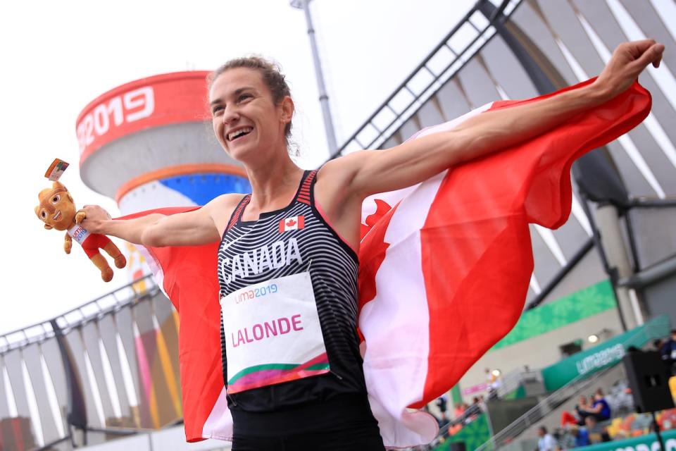 Genevieve Lalonde of Canada celebrates her victory in Women's 3,000m Steeplechase Final on Day 15 of Lima 2019 Pan American Games at Athletics Stadium of Villa Deportiva Nacional on August 10, 2019 in Lima, Peru.