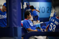 South Korea's Baekho Kang sits on the bench after a semi-final baseball game against the United States at the 2020 Summer Olympics, Thursday, Aug. 5, 2021, in Yokohama, Japan. The United States won 7-2. (AP Photo/Sue Ogrocki)