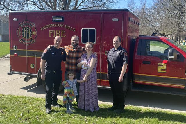 <p>City of Farmington Hills, Michigan - Municipal Government Facebook</p> Sgt. Tim Persichino and Sgt. Robin Chevrette with the Norsigian family