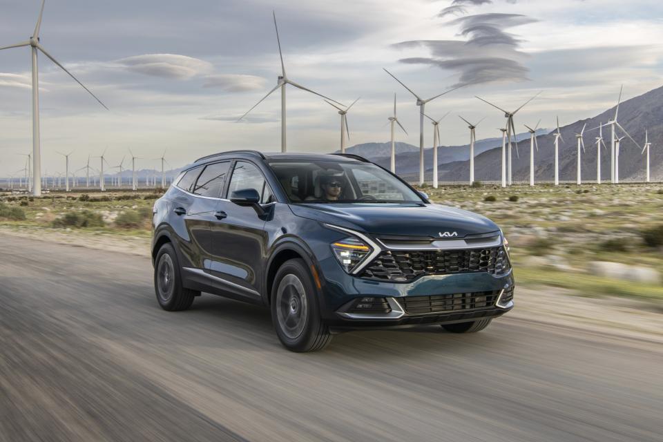 This photo provided by Kia shows the 2024 Sportage Hybrid. The hybrid version of the Sportage is the Edmunds Top Rated SUV for 2024 and gets up to 43 mpg combined. (Courtesy of Kia America via AP)