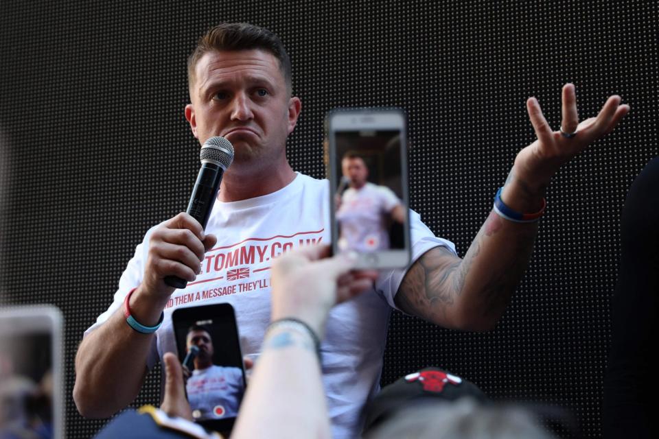 Tommy Robinson filmed ‘punching England fan' at Nations League game