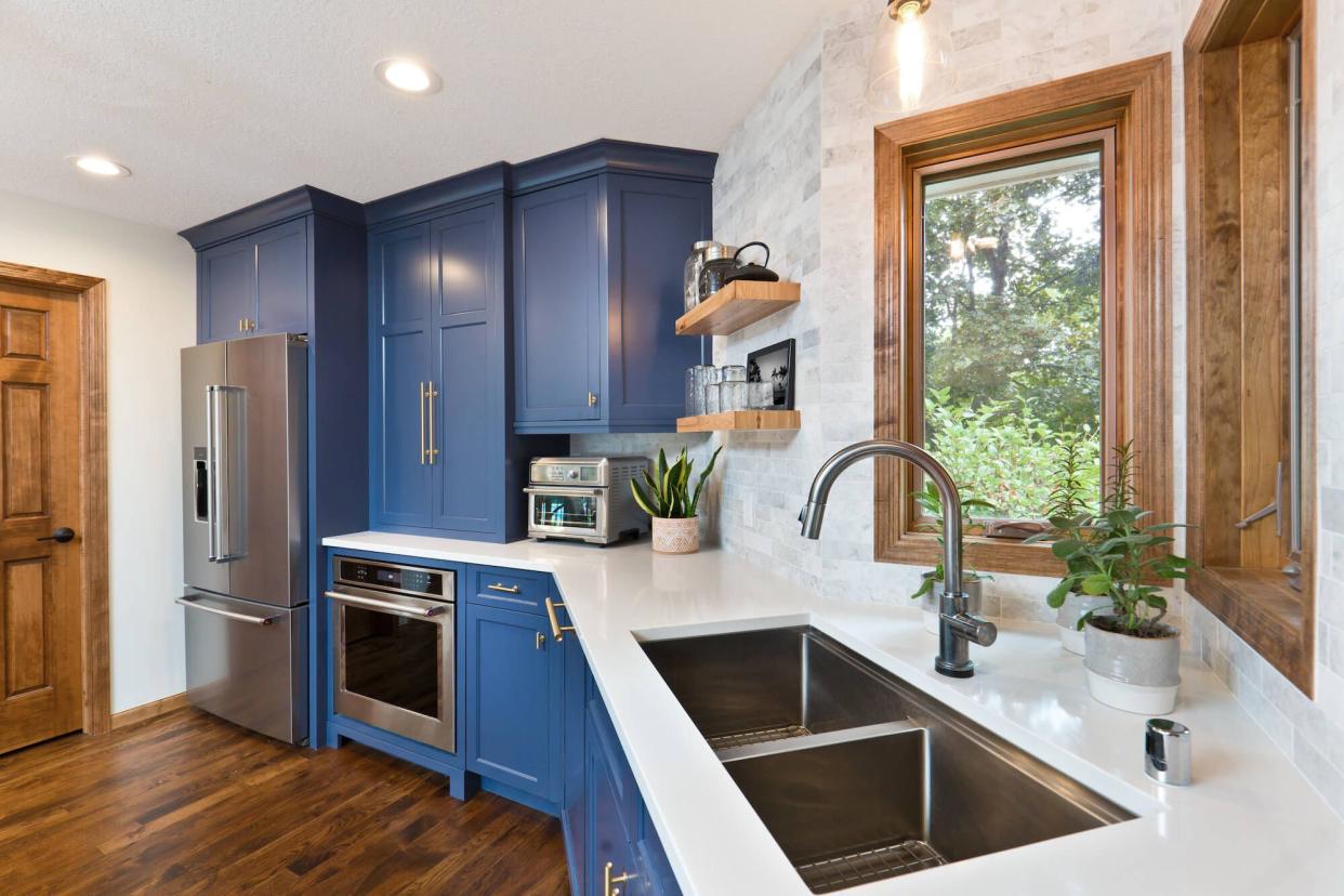 : a contemporary kitchen with a stainless steel sink