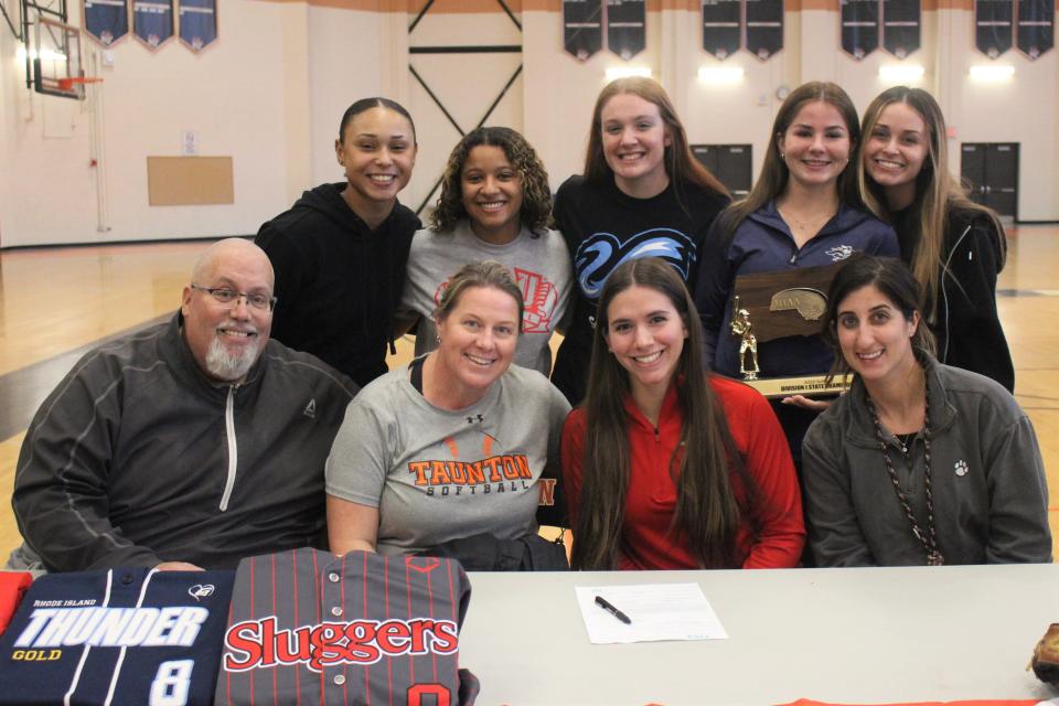 From left to right bottom row: Taunton junior varsity softball coach Mike Fox, former Taunton softball coach Carrie Consalvi, Ava Venturelli and Taunton softball assistant coach Meaghan Kirby. Top row: Angie Lynch, Kyleah Plumb, Hayley Krockta, Kaysie DeMoura and Liv Mendonca during an NLI signing ceremony on Nov. 14, 2022.