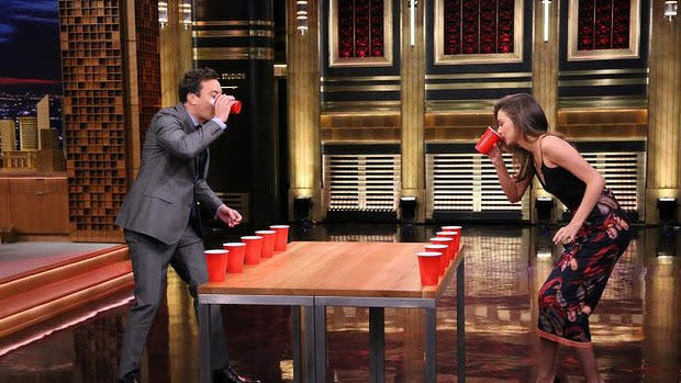 Miranda Kerr drinks beer on Jimmy Fallon.