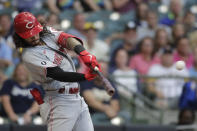 Cincinnati Reds' Jonathan India hits an RBI-double during the second inning of a baseball game against the Milwaukee Brewers, Monday, June 14, 2021, in Milwaukee. (AP Photo/Aaron Gash)