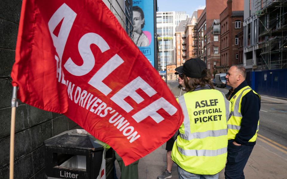 Aslef union members on a picket line near to Leeds train station during strikes earlier this month - Danny Lawson/PA Wire