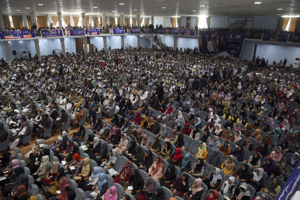 Supporters of Afghan presidential candidate Ashraf Ghani attend the first day of campaigning in Kabul, Afghanistan, Sunday, July 28, 2019. Sunday marked the first day of campaigning for presidential elections scheduled for Sept. 28. President Ghani is seeking a second term on promises of ending the 18-year war but has been largely sidelined over the past year as the U.S. has negotiated directly with the Taliban. (AP Photo/Rahmat Gul)