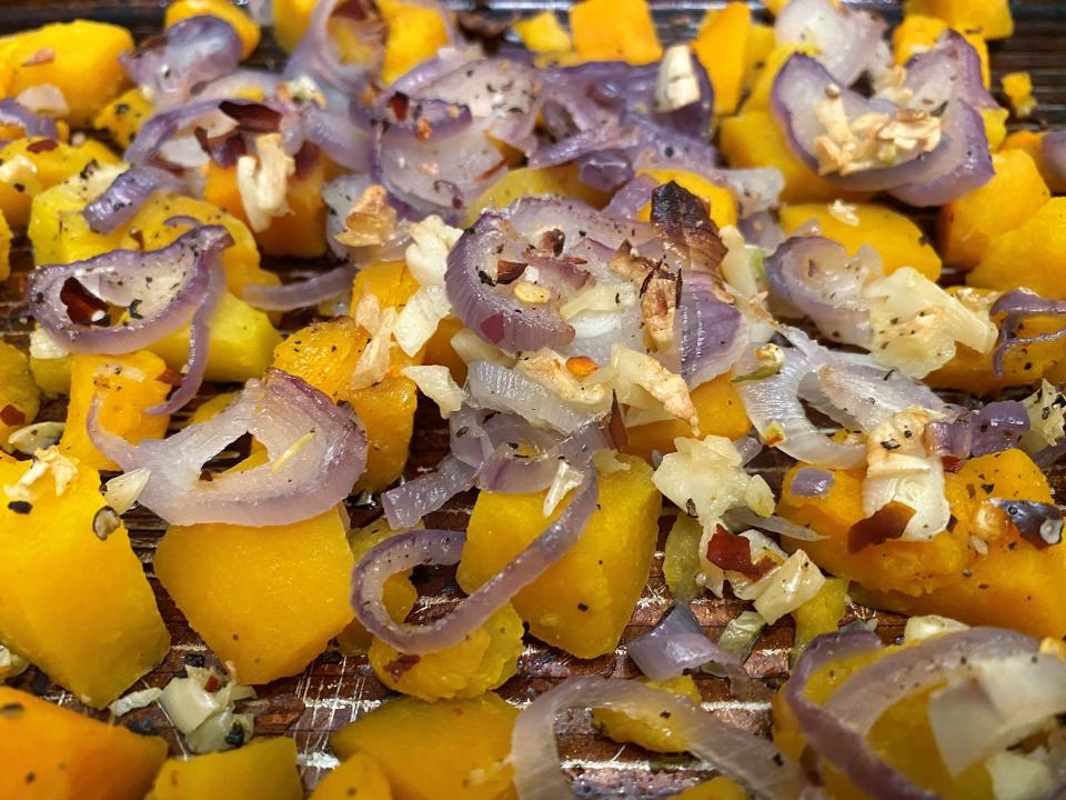 Toss in a touch of sharp-tasting garlic and shallots, along with a spicy pinch of crushed red pepper flakes, and this butternut squash is all set for the occasion.