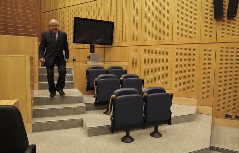 Cypriot President of the House of Representatives Yiannakis Omirou is seen following a parliament session in Nicosia, March 19, 2013. Cypriot President Nicos Anastasiades has called an emergency meeting of party leaders Wednesday in a frantic search for a viable plan B after MPs rejected the terms of an EU bailout aimed at saving Cyprus from bankruptcy