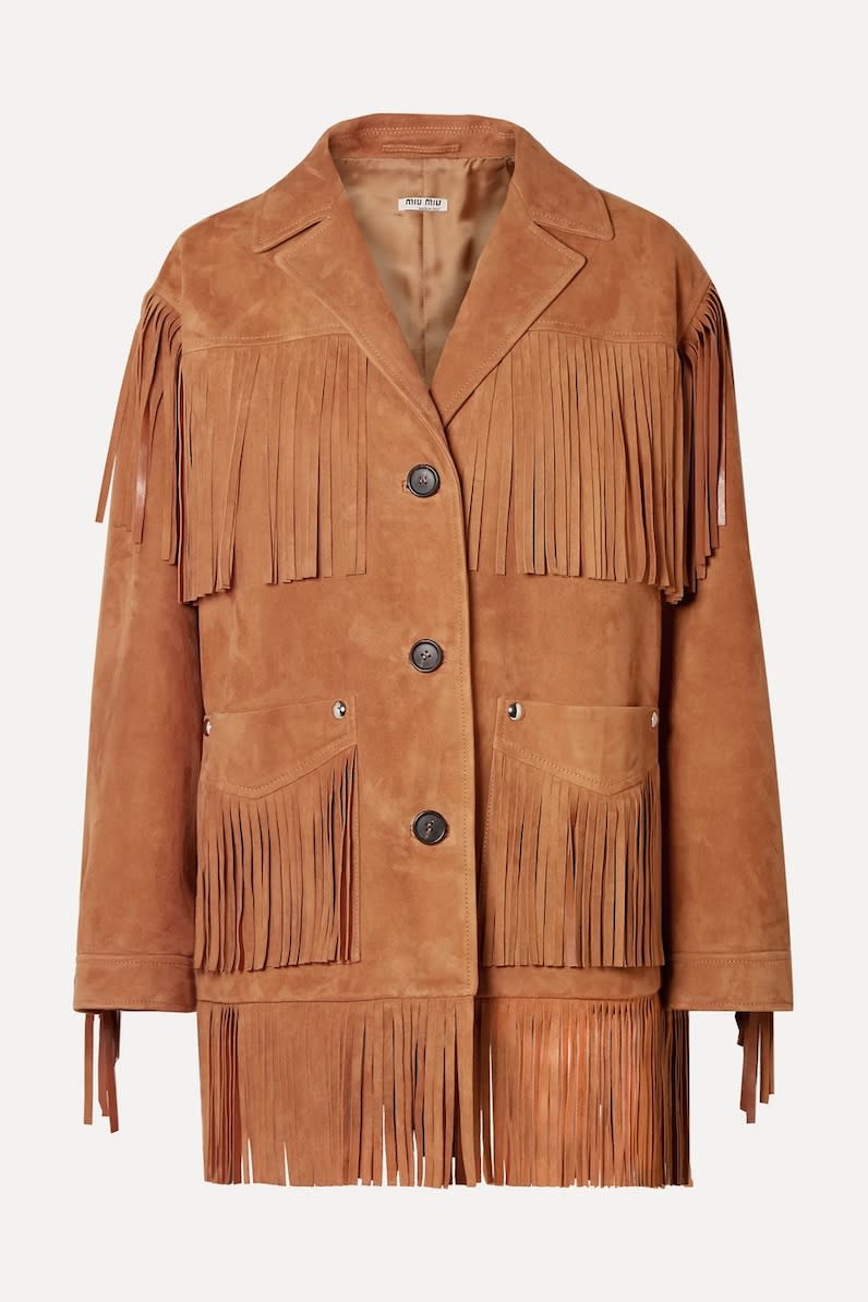 3900€<br><br><a href="https://www.net-a-porter.com/en-fr/shop/product/miu-miu/oversized-fringed-suede-jacket/1107205" rel="nofollow noopener" target="_blank" data-ylk="slk:Acheter;elm:context_link;itc:0;sec:content-canvas" class="link ">Acheter</a>