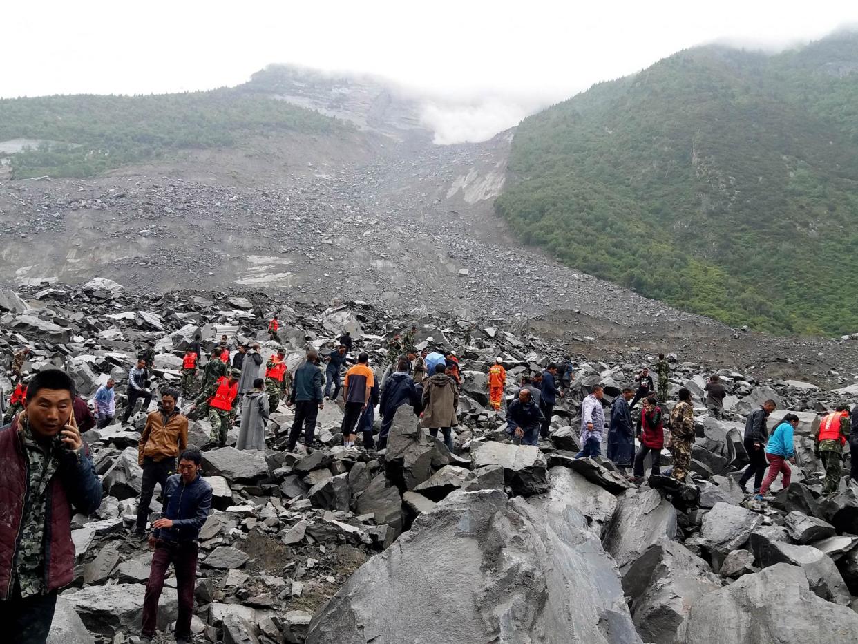 China is one of the most landslide-prone countries, and new research suggests acid rain may have a role in triggering such events: STR/AFP/Getty Images