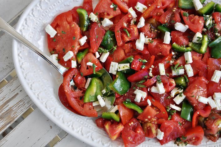 <strong>Get the <a href="http://food52.com/recipes/6775-heirloom-tomato-salad-with-feta-oregano-flowers" target="_blank">Heirloom Tomato Salad with Feta & Oregano Flowers recipe</a> from Food52</strong>