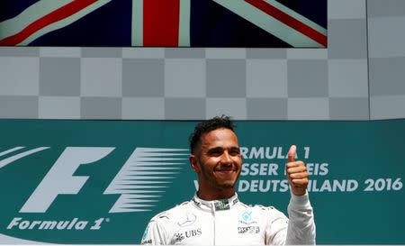 F1 - German Grand Prix 2016 - Hockenheimring, Germany - 31/7/16 - Mercedes' Lewis Hamilton gives thumb up after winning the race. REUTERS/Ralph Orlowski