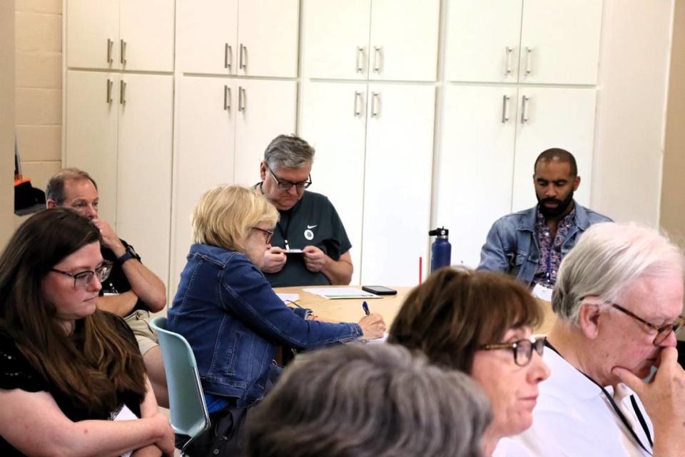 Ilene Kent takes notes during GIPL’s Green Team 101 meeting at St. Thomas Episcopal.