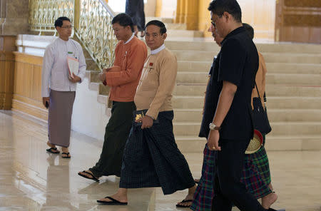 Win Myint, who recently resigned his post of speaker of the Lower House of Parliament, leaves the parliament, in Naypyitaw, Myanmar March 22, 2018. REUTERS/Stringer