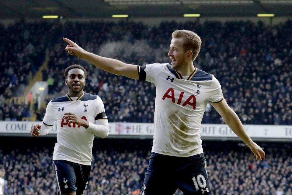 Tottenham Hotspur's Harry Kane, right, celebrates scoring his side's third goal during the English Premier League soccer match between Tottenham Hotspur and West Bromwich Albion at White Hart Lane stadium in London, Saturday, Jan. 14, 2017. (AP Photo/Matt Dunham)