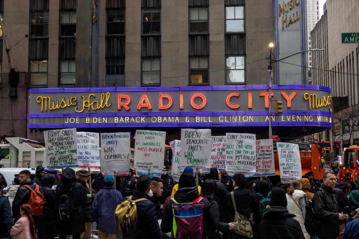 Demonstrators rally before President Joe Biden's fundraiser on March 28, 2024 at Radio City Music Hall in New York City. Biden will be joined by former presidents Bill Clinton and Barack Obama at the event.