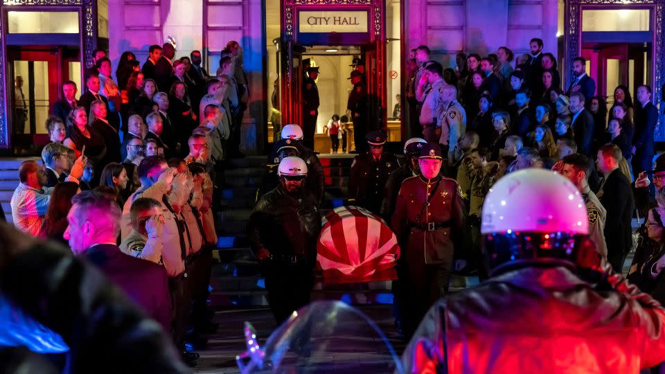 Honor guard members carry the casket of the late Sen. Dianne Feinstein down the steps of San Francisco City Hall to a waiting hearse following a day of lying in state at city hall on Wednesday, October 4, 2023.  - Carlos Avila Gonzalez/Pool/Reuters