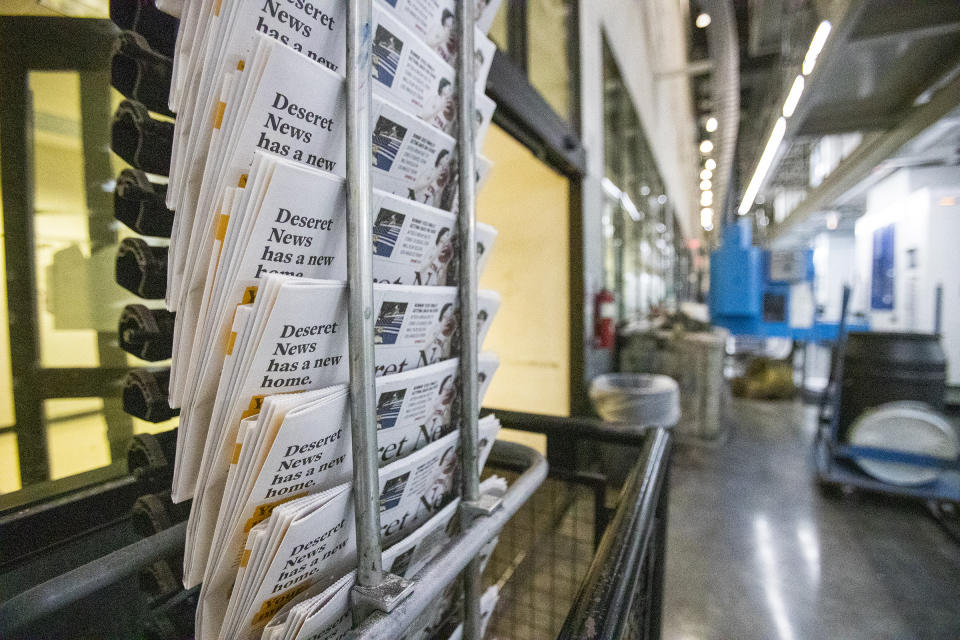 Copies of the last daily edition of the Deseret News move along the wrack at the MediaOne building in West Valley City, Utah, on Wednesday, Dec. 30, 2020. Both of Salt Lake City's major newspapers released their final daily print editions Thursday as the two publications transition to weekly editions. The Salt Lake Tribune, which won the Pulitzer Prize for local reporting in 2017, will continue to publish breaking stories online every day. The 170-year-old Deseret News in the state capital will also shift its attention online and offer a monthly magazine which will debut in January. (Scott G Winterton/The Deseret News via AP)