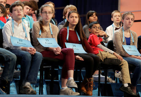 Children watch a competitor during the 2017 Scripps National Spelling Bee at National Harbor in Oxon Hill, Maryland, U.S., May 31, 2017. REUTERS/Joshua Roberts