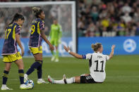 Germany's Alexandra Popp, on the ground. Complains of a foul during the Women's World Cup Group H soccer match between Germany and Colombia at the Sydney Football Stadium in Sydney, Australia, Sunday, July 30, 2023. (AP Photo/Mark Baker)