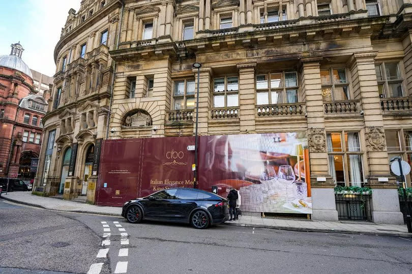 The Cibo hoardings are up outside the former Rosso Restaurant on Manchester's Spring Gardens -Credit:Cibo